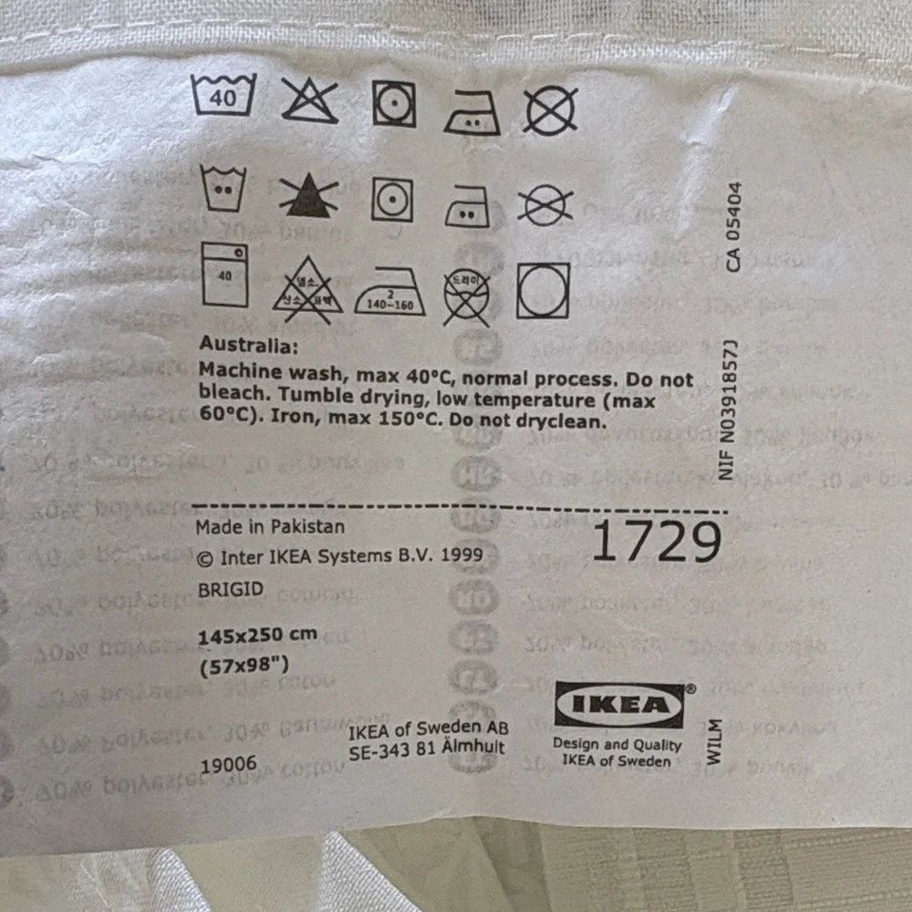 IKEA Brigid Sheer White Curtain pair with Flower Print 57” x 98”